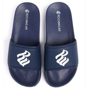 A brand new pair of Rocawear sandals